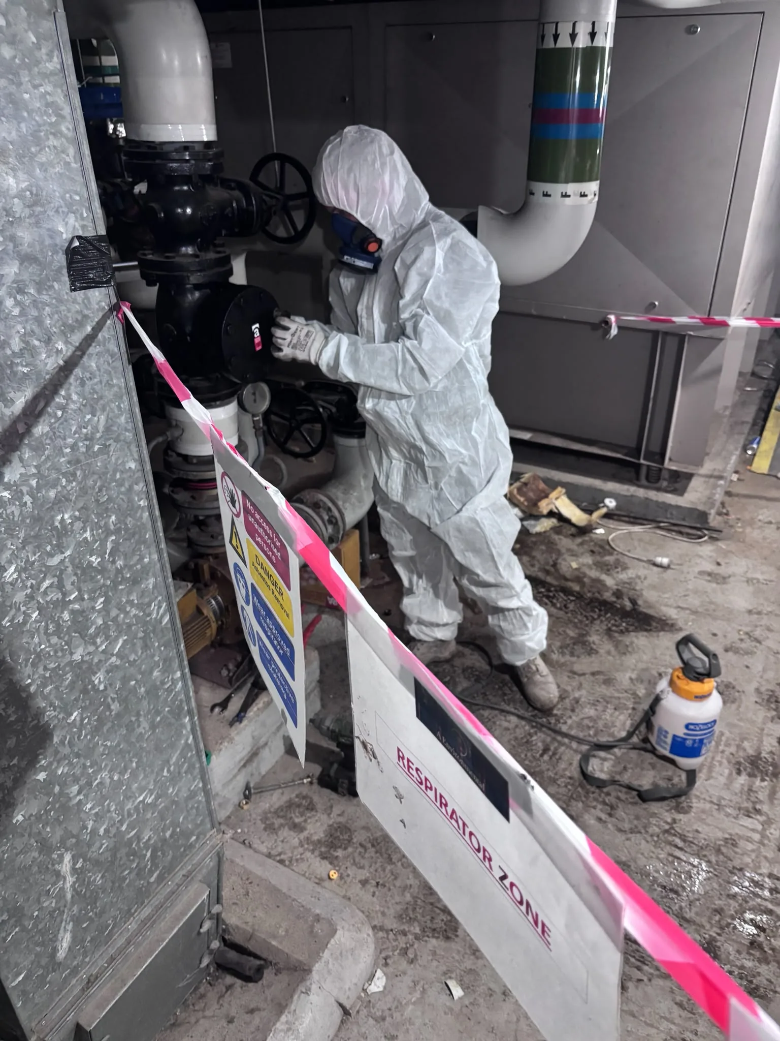 Asbestos artex removal from concrete soffit in West Ealing